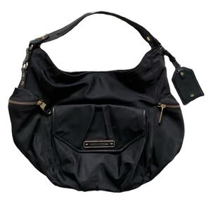 Juicy Couture black nylon hobo purse. Very clean and classy. No call outs,